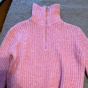 pink sweater with turtle neck and zipper